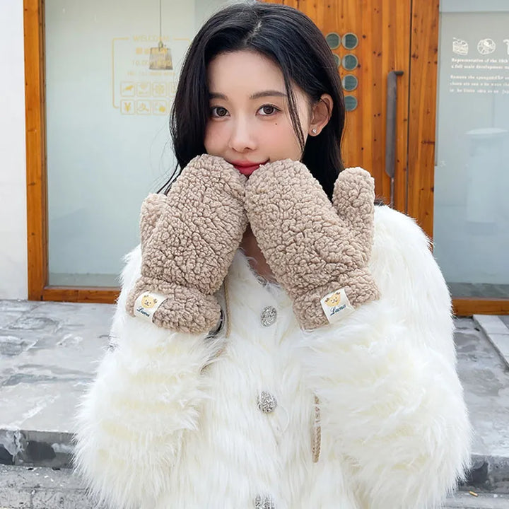 Essential winter accessory: warm, soft, plush teddy mittens for women's comfort.