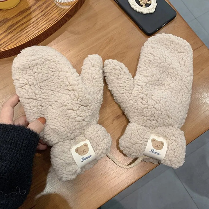 Ultra-soft women's plush teddy mittens, ideal for keeping hands toasty in winter.