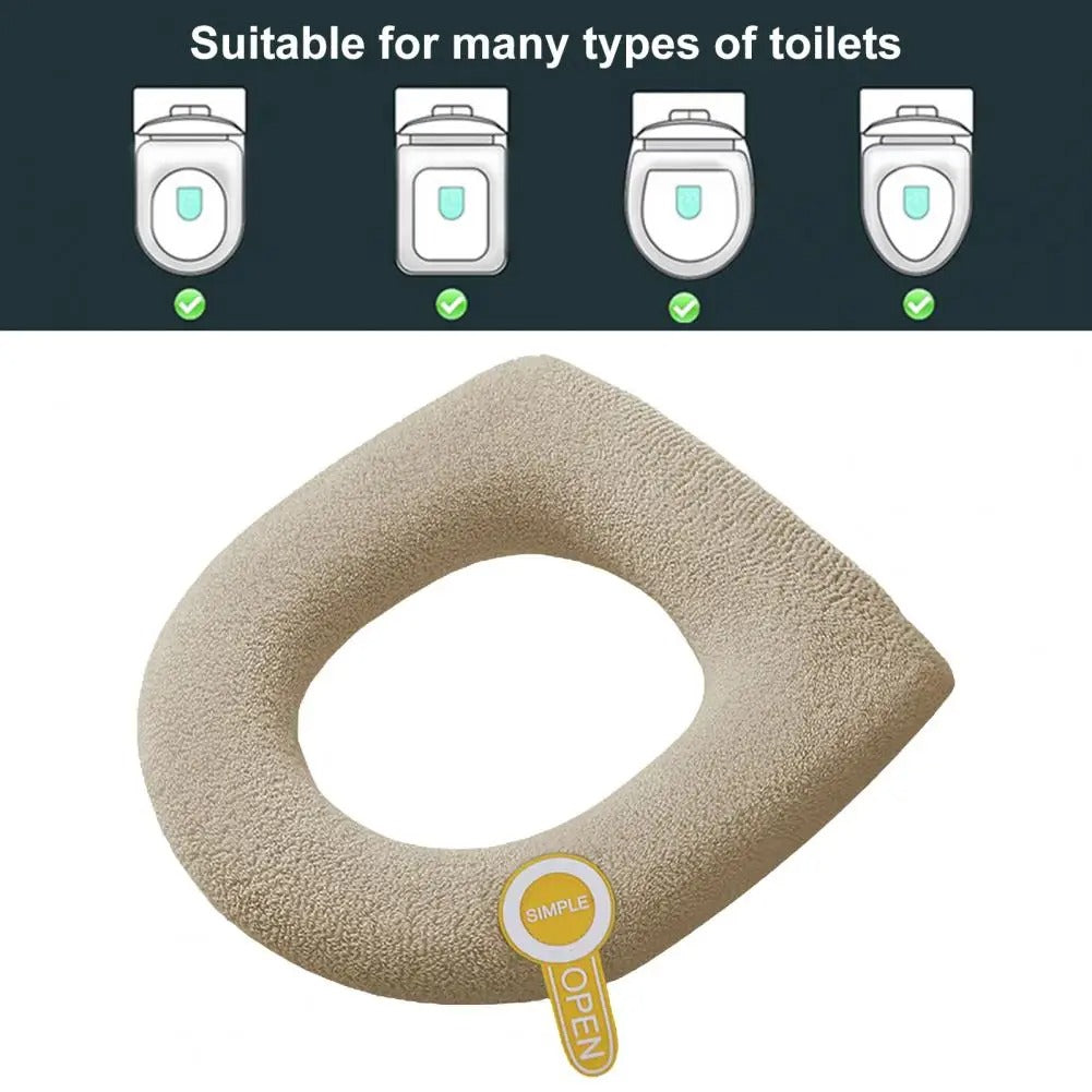 Unisex warm toilet seat cushion cover. Soft, easy to install, polyester bathroom accessory for added comfort.