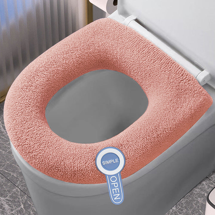 Polyester toilet seat cushion cover in gray, providing soft, warm, and hygienic comfort for your bathroom.