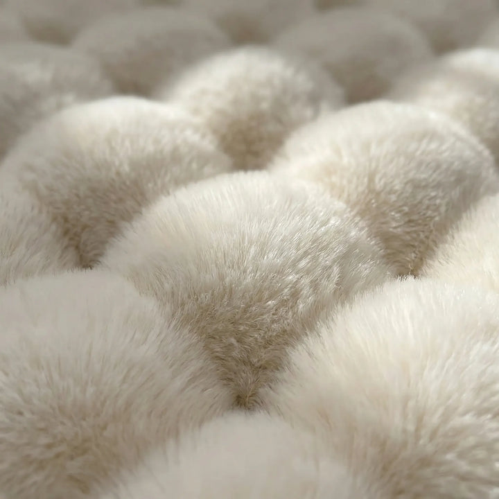Cozy round plush bedroom rug with scalloped waves, bringing comfort and style to your home.