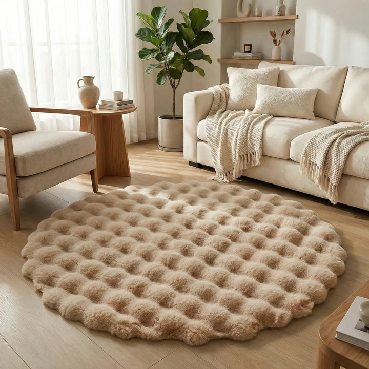 Flowique round plush area rug with gentle wave patterns, a soft and stylish addition to any room.
