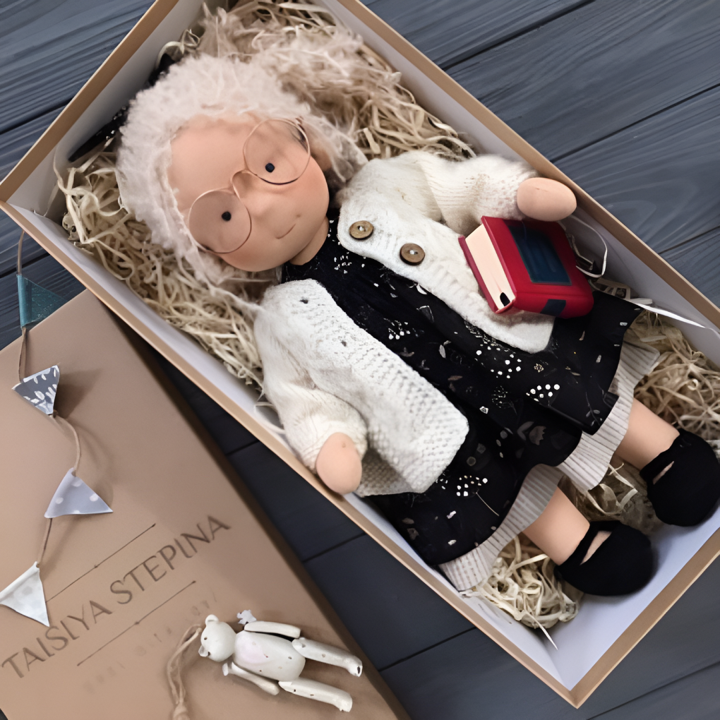 Soft Waldorf doll, handmade from natural fibers, perfect for children's imaginative play.