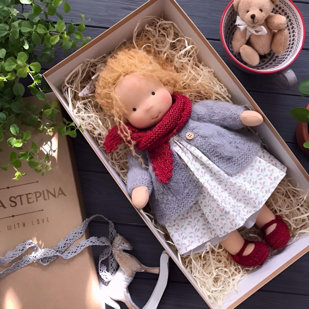 Eco-friendly Waldorf doll, a soft and cuddly children's toy made from natural fibers.