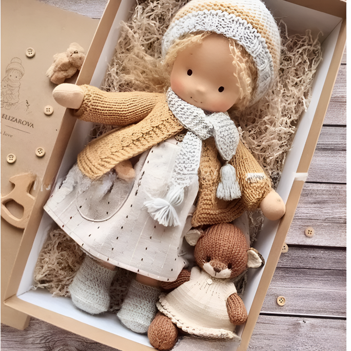Cuddly natural fiber Waldorf doll, a handmade children's toy for nurturing play.