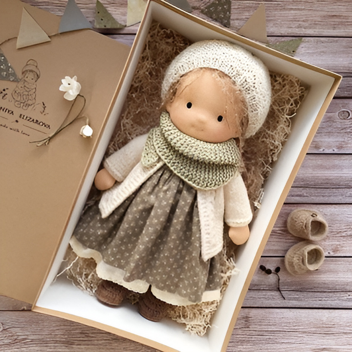 Handmade Waldorf doll, a gentle, cuddly toy made from natural fibers for children's play.