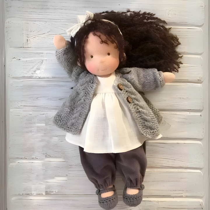 Children's Waldorf doll, a cherished, soft companion for imaginative play and comfort.