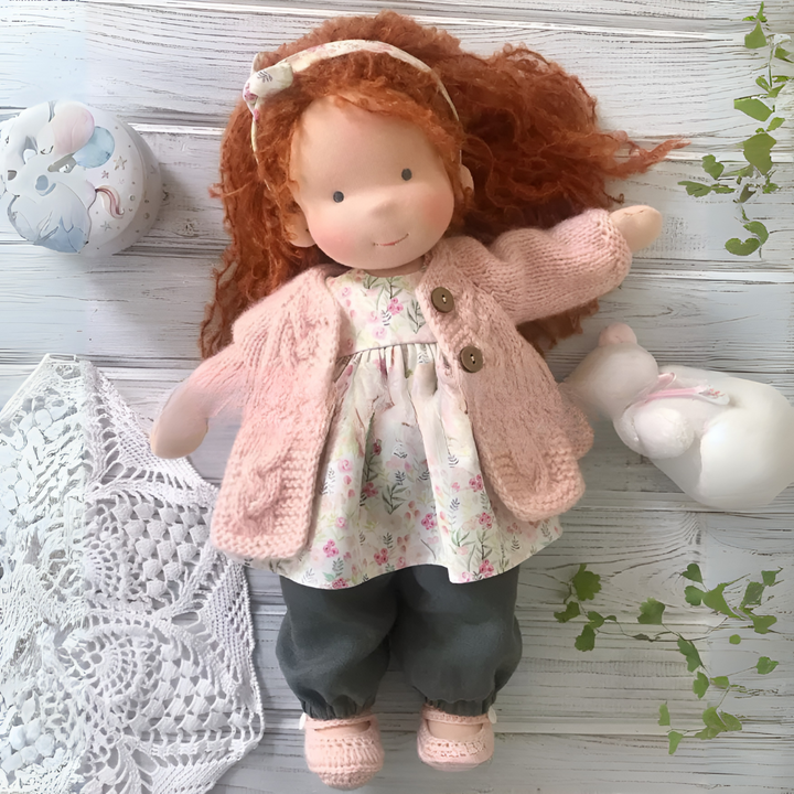 Cuddly Waldorf doll, a natural fiber toy handcrafted for joyful imaginative play.