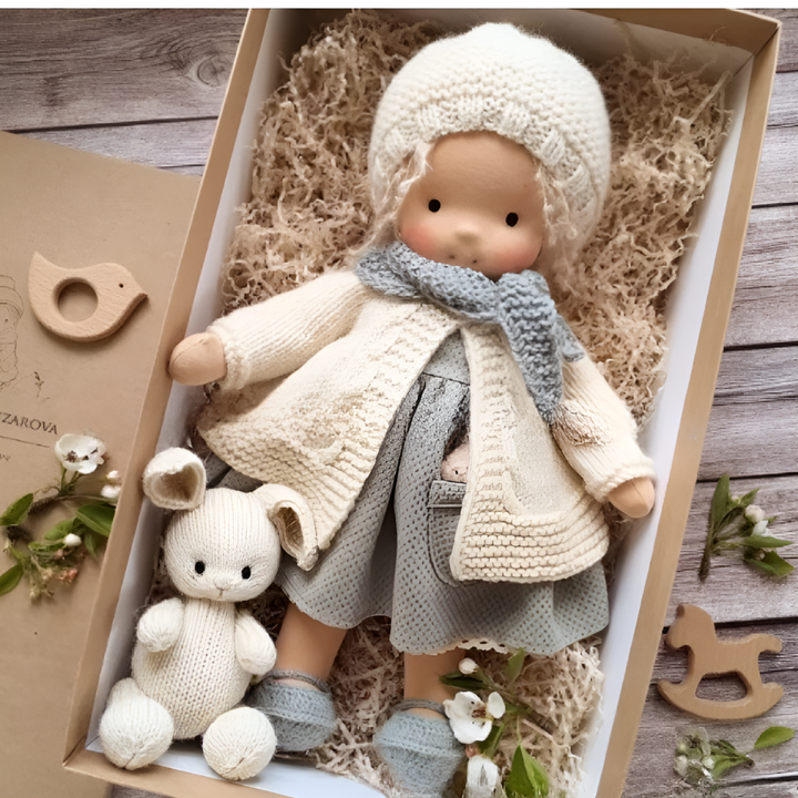 Soft Waldorf doll, an endearing cuddly toy, handcrafted for toddlers' imaginative adventures.
