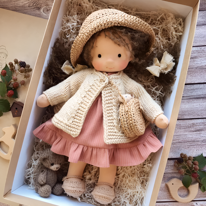 Handmade Waldorf doll, a comforting natural fiber toy, perfect for children's imaginative journeys.