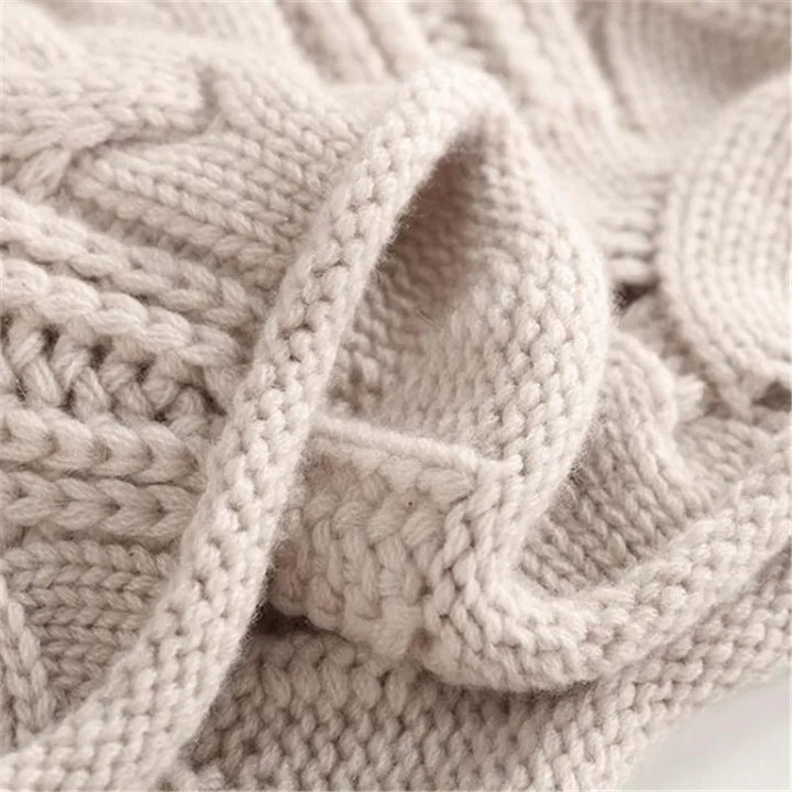 Comfortable women's warm turtleneck sweater, an essential knitwear piece for elegant autumn & winter outfits.