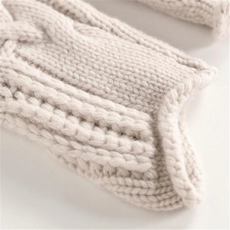 Women's cozy knit turtleneck sweater in a soft fabric, ideal for warmth and stylish winter fashion.