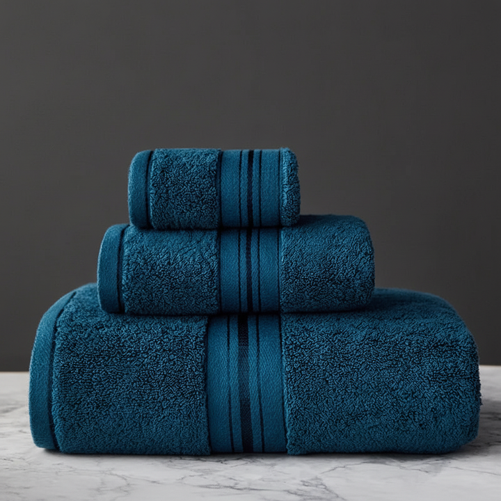 Luxurious soft cotton bath towel draped, part of an absorbent towel set for elegant bathroom decor