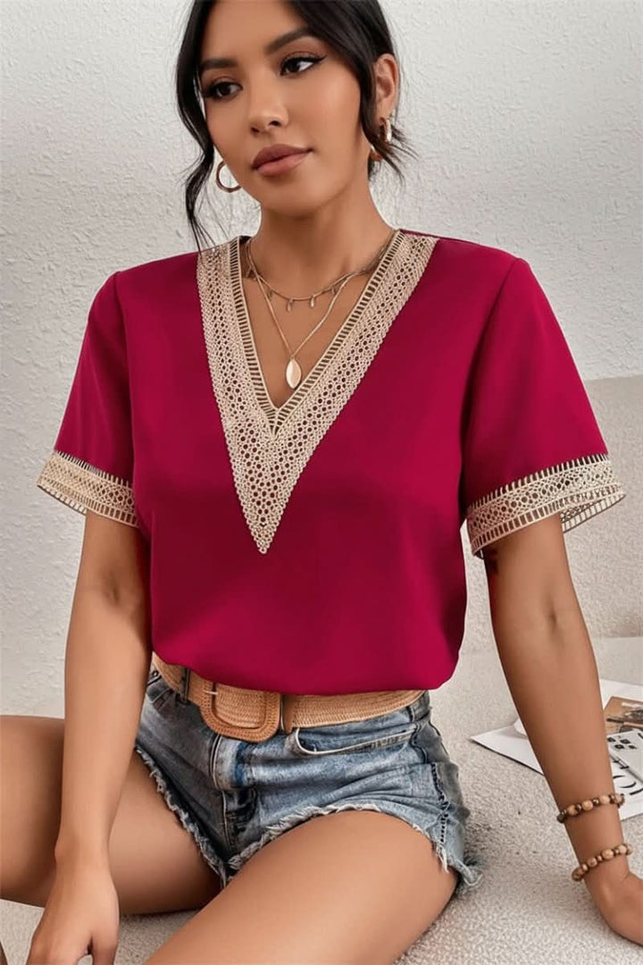 Woman wearing a comfortable short-sleeve crew neck t-shirt. Perfect everyday casual women's top.