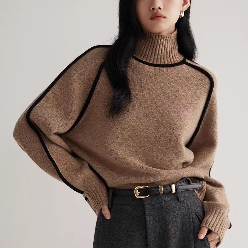 Soft women's turtleneck sweater for cozy comfort, ideal for fall/winter fashion. Chic long-sleeve knit top.