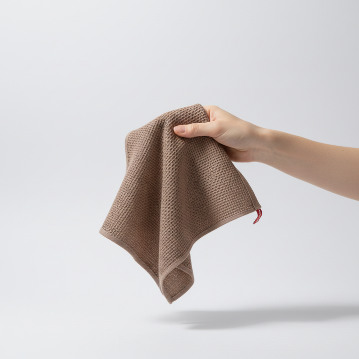 Pack of SoftTowel cotton towels showcasing their rich texture, essential for ecofriendly cleaning