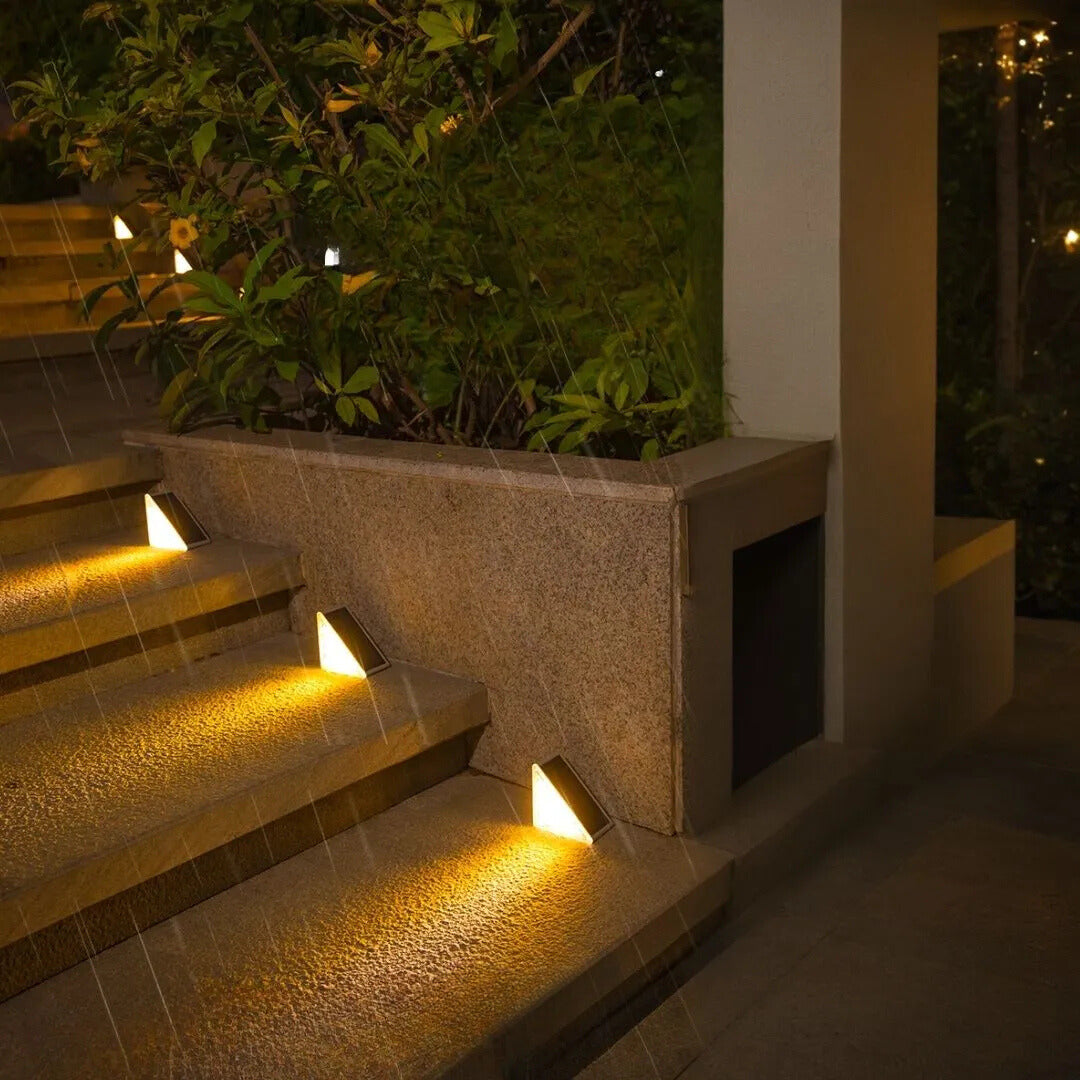 Compact solar-powered step lighting fixture for safe path illumination