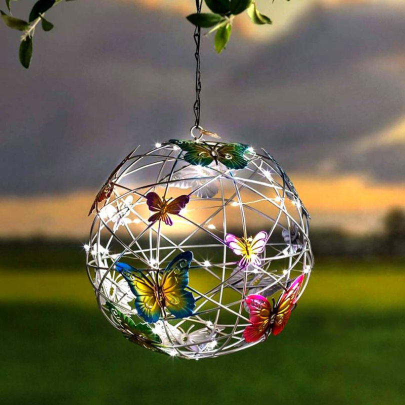 Solar-powered butterfly LED garden lights illuminate patios. Waterproof, energy-saving outdoor decor.