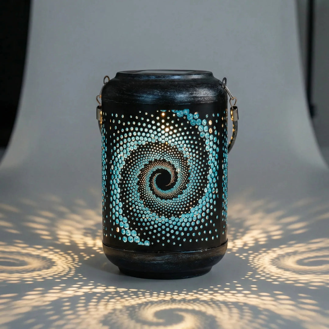 Glowneon solar garden spiral projector casting an intricate glow pattern, perfect for outdoor decor.