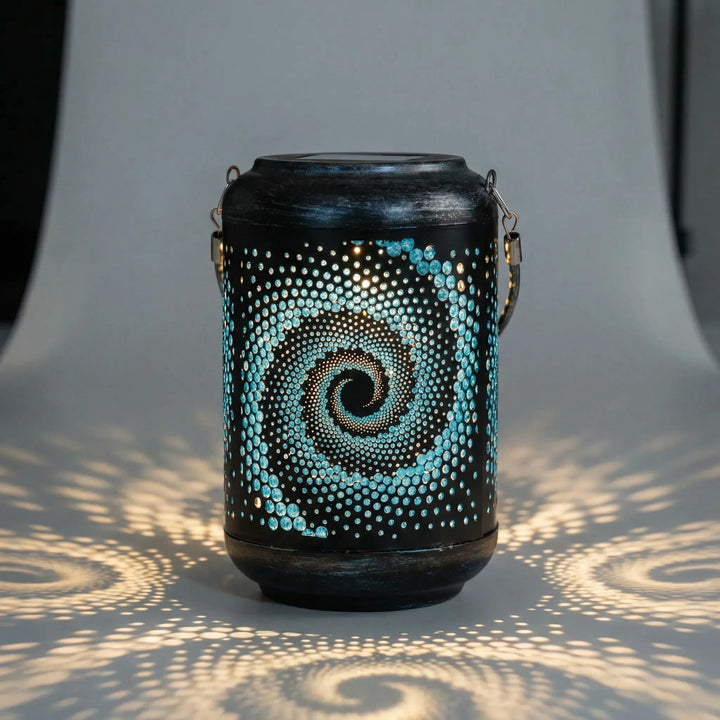 Glowneon solar garden spiral projector casting an intricate glow pattern, perfect for outdoor decor.