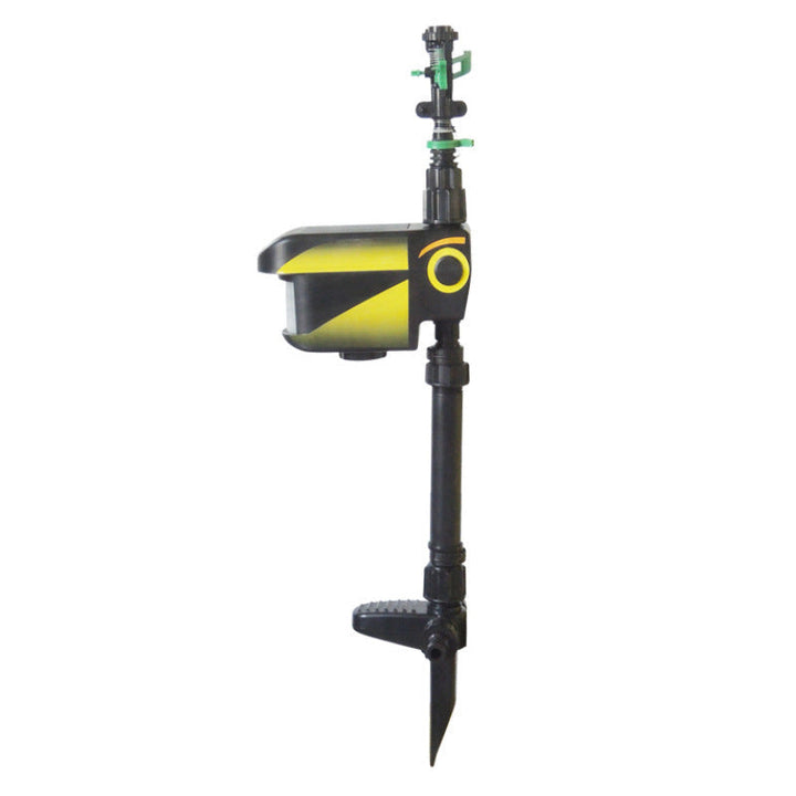 Solar-powered motion-activated sprinkler deters deer from gardens, an eco-friendly pest control solution.