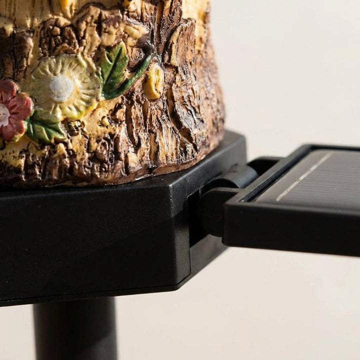Decorative solar animal garden stake light, energy-efficient LED, enhances outdoor ambiance at night.