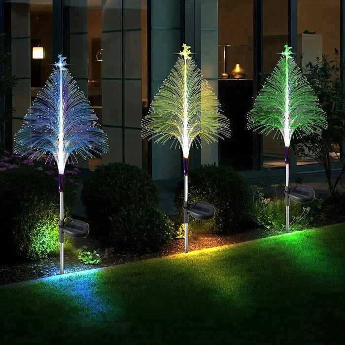 Vibrant RGB solar Christmas tree lights creating a magical festive ambiance in any garden.