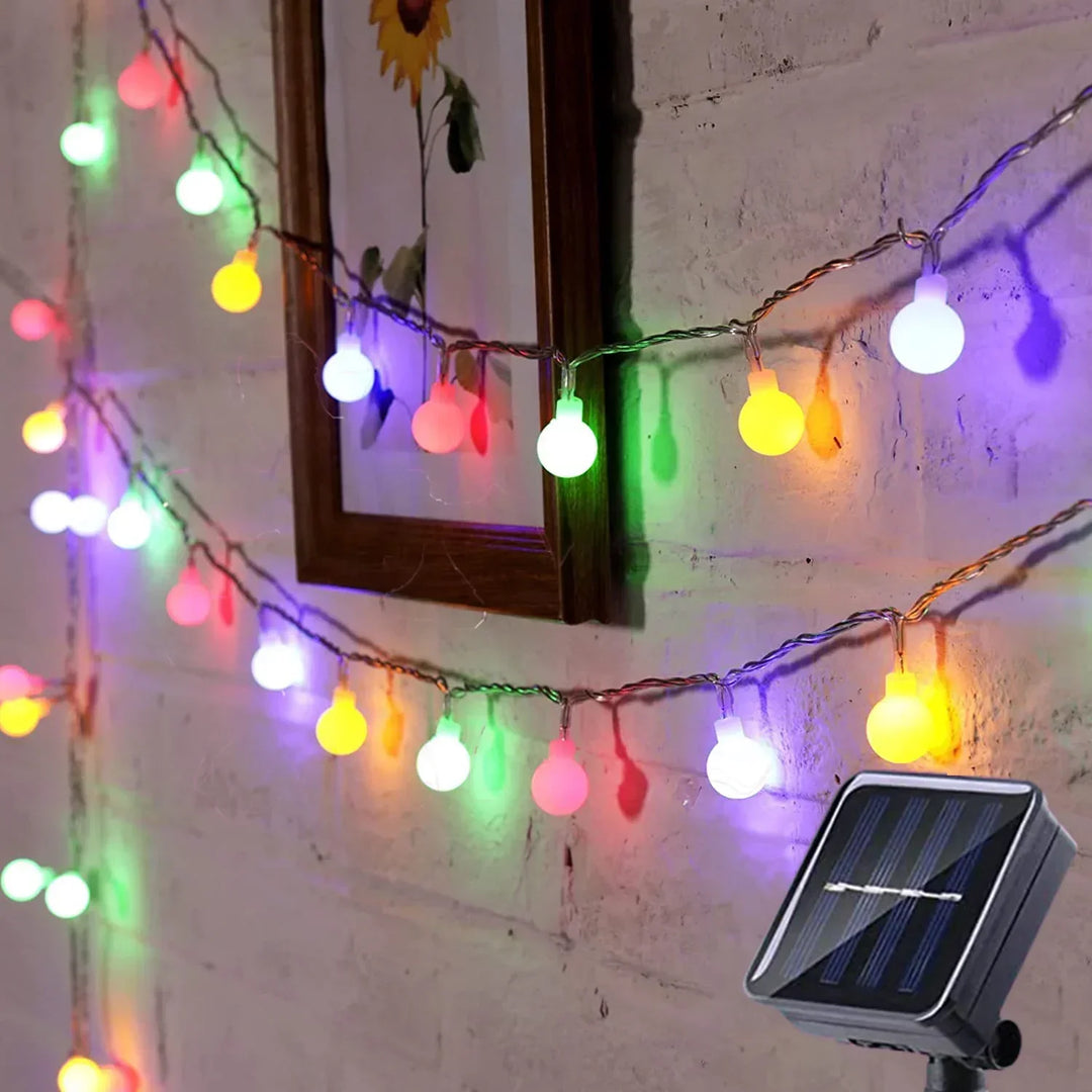 Bright LED solar string lights for enchanting outdoor ambiance. Perfect garden & patio decor.