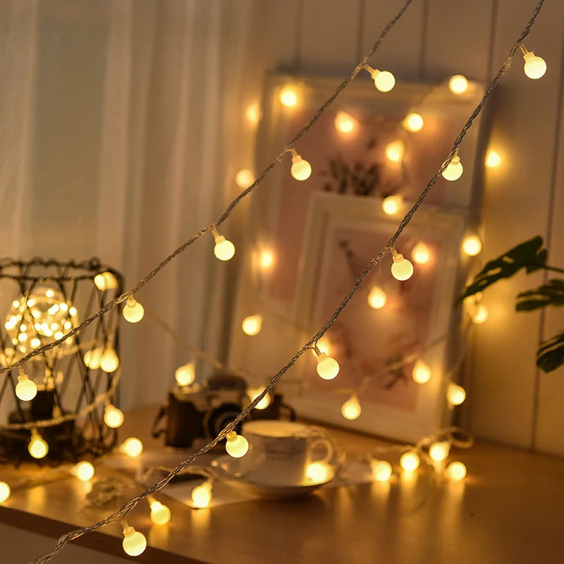 Long string of solar LED lights. Waterproof for outdoor garden, patio, party festive decor.