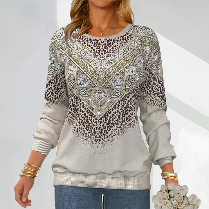 Women's gray knit sweater with a versatile pattern, ideal for fall fashion