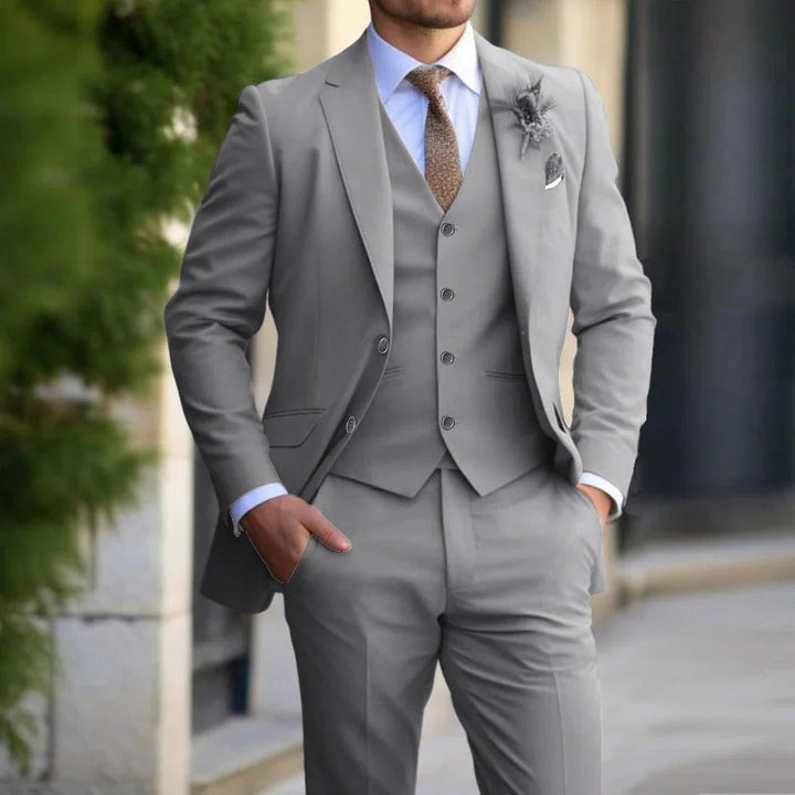 Sharp black men's 3-piece slim fit suit for professional business attire, formal events & wedding wear.