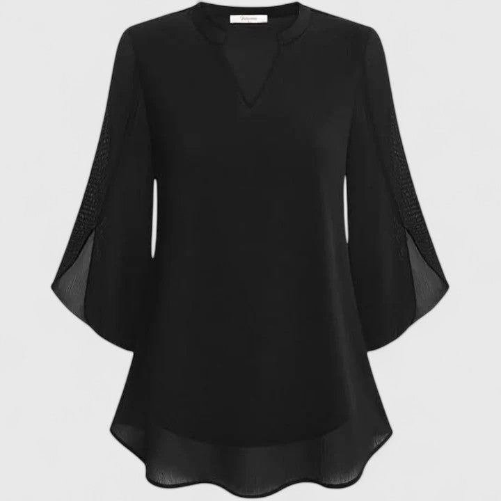 Sophisticated women's blouse, perfect for versatile office and elegant evening wear. A chic fashion top.