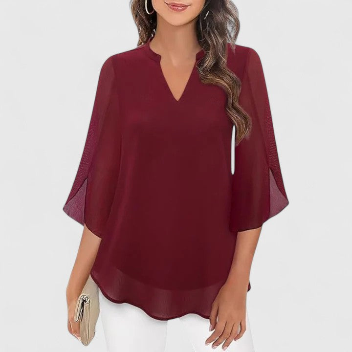 Premium women's sophisticated blouse, a versatile fashion top for elegant office and stylish evening wear.