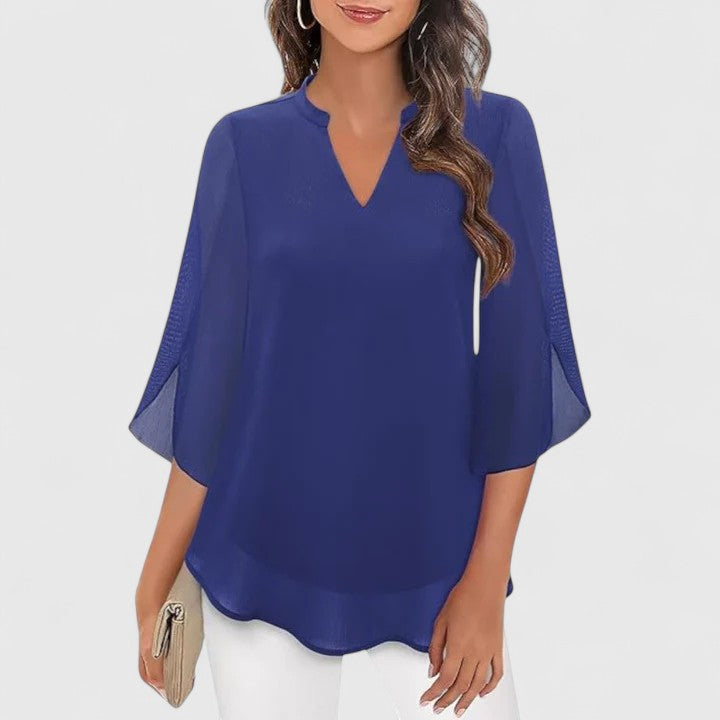 High-quality women's blouse, offering sophisticated appeal for office professionalism & chic evening elegance.