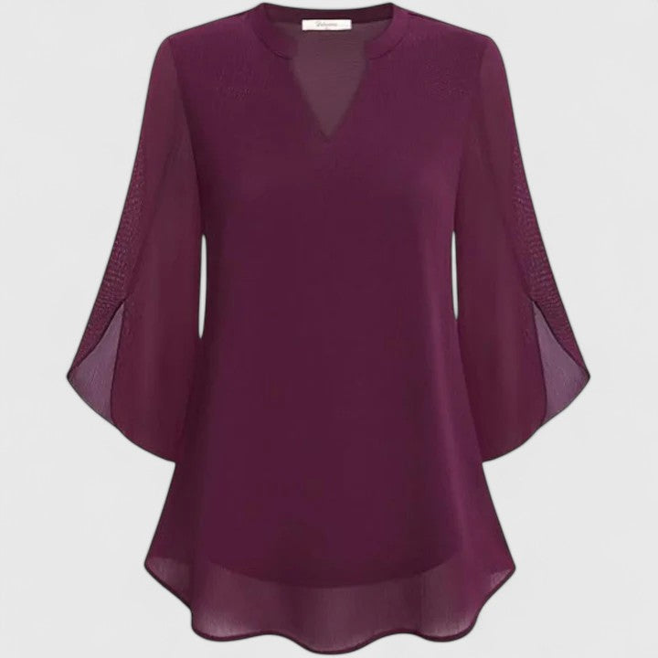 Elegant women's blouse for professional office attire & stylish evening fashion. A sophisticated and versatile top.