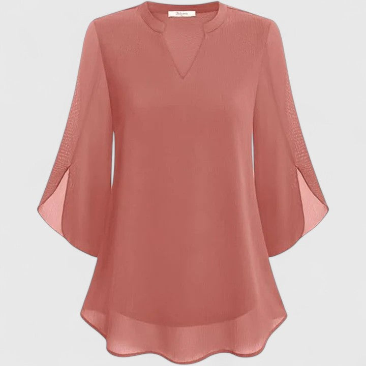 Chic women's blouse, designed for sophisticated office wear and elegant evening events. Fashionable & versatile.