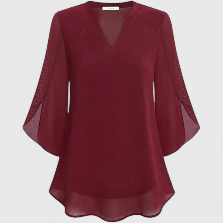 Versatile women's blouse, ideal for effortless office elegance & chic evening style. A sophisticated fashion top.