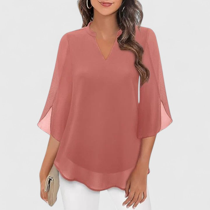 Effortless chic women's blouse, providing sophisticated style for professional office & elegant evening fashion.
