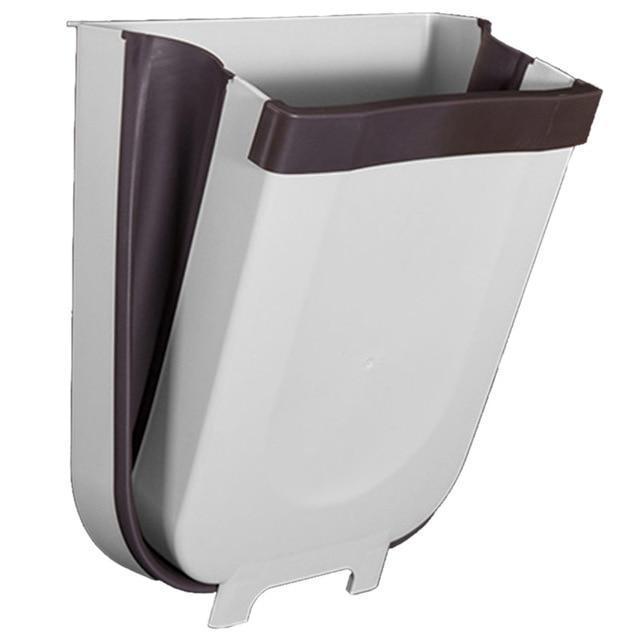 Space-saving foldable wall-mounted kitchen waste bin in grey, perfect for small kitchens & home organization.