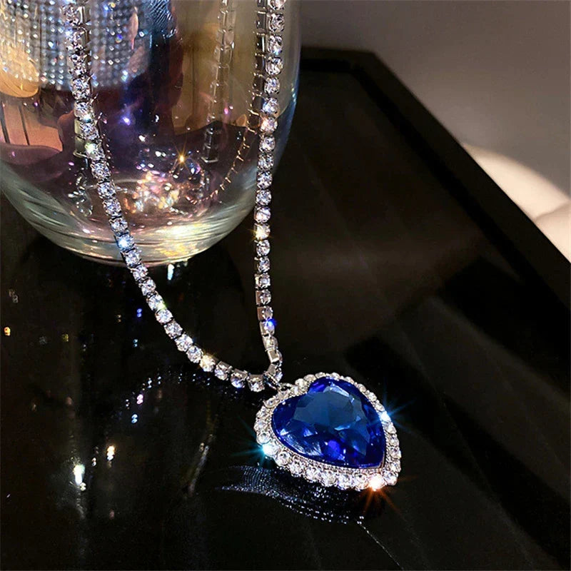 Brilliant sparkling blue heart crystal pendant necklace, women's fashion jewelry for special occasions.