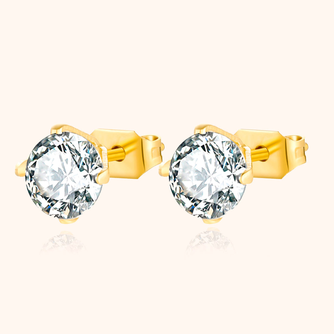 Close-up: Brilliant cubic zirconia mini earrings. Gold-plated for a luxurious and sparkling look.