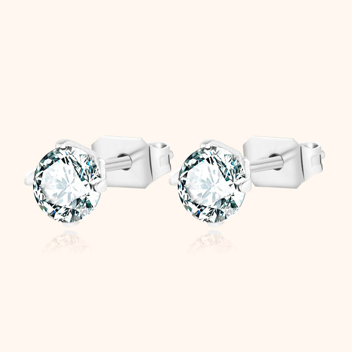 Gift-ready sparkling cubic zirconia mini earrings. Dainty sterling silver jewelry for any occasion.