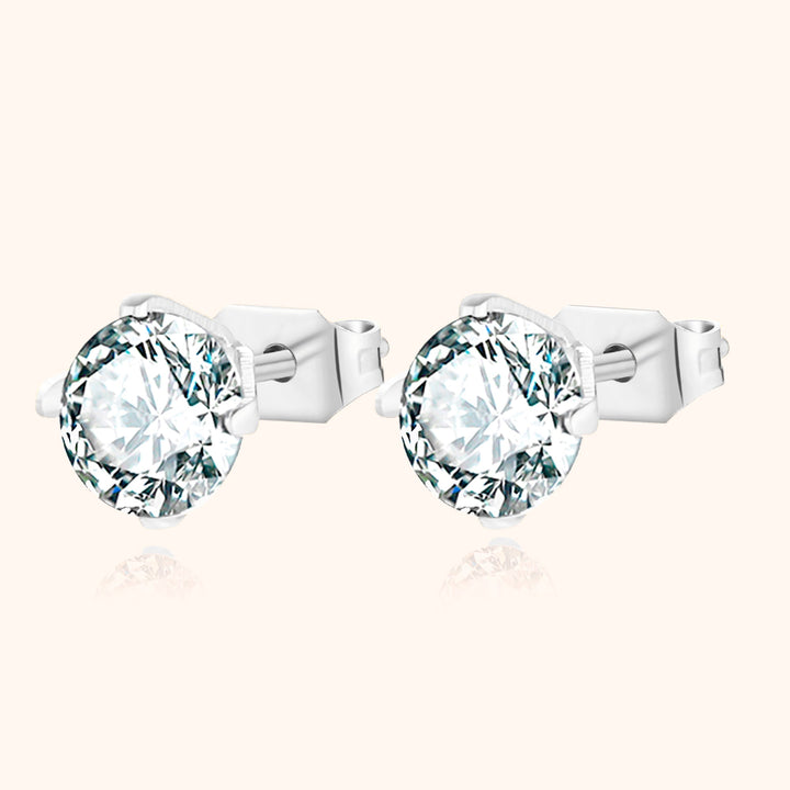 Minimalist women's mini earrings with sparkling cubic zirconia. Ideal for chic everyday wear.