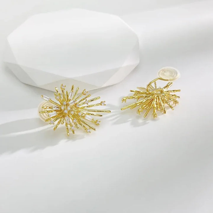 Sparkling gold firework zirconia earrings for women, crafted from hypoallergenic sterling silver.