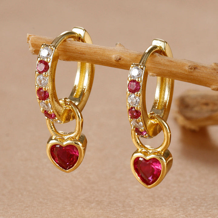 Women's elegant heart earrings, gold finish with sparkling zircon, ideal for everyday style and special moments.