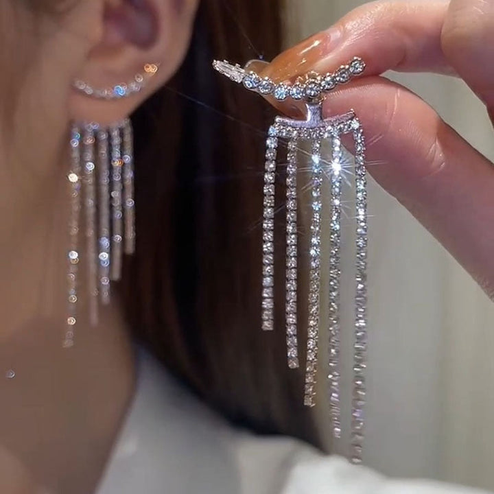 Sparkling rhinestone dangle earrings for women, elegant silver tone fashion jewelry.