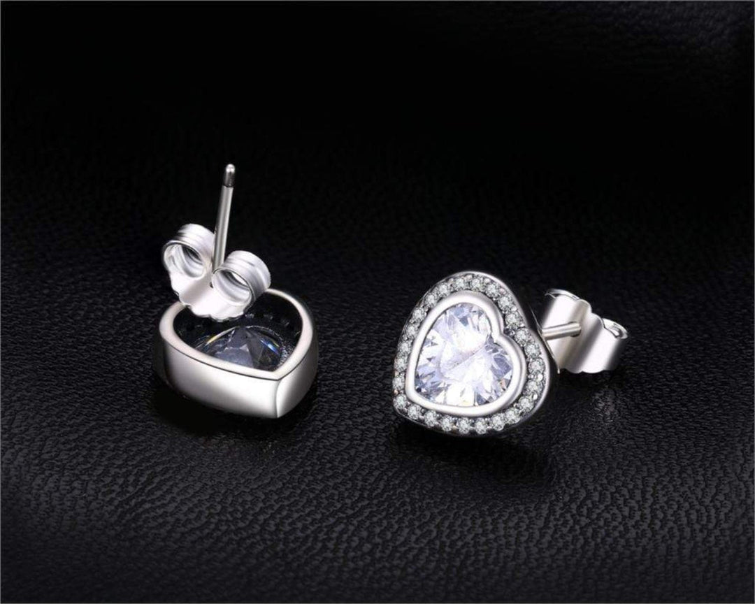 Sparkling silver heart earrings with zirconia for women, elegant jewelry gift. Perfect for special occasions.
