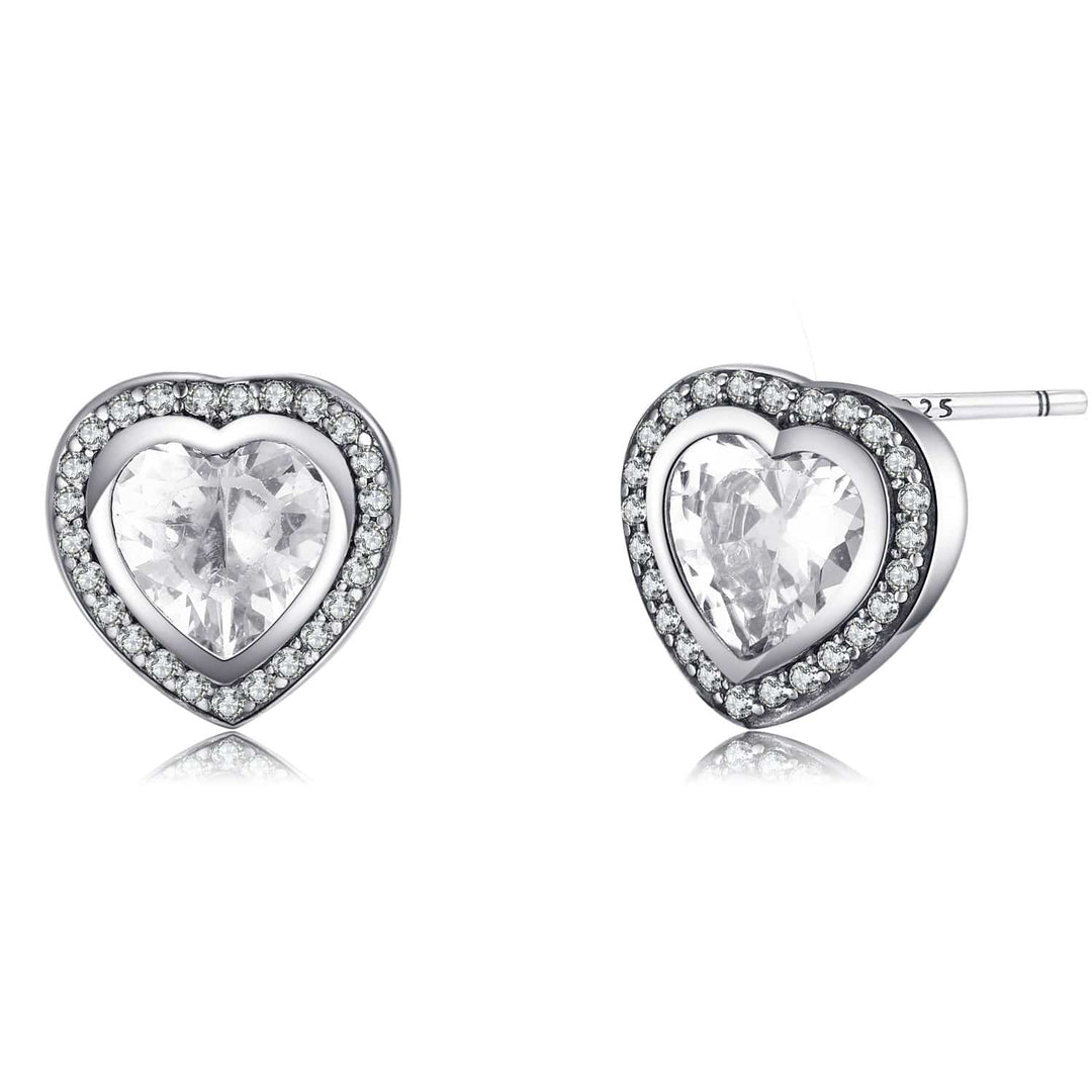 Dazzling silver heart-shaped earrings with brilliant zirconia stones, a stunning women's jewelry accessory.