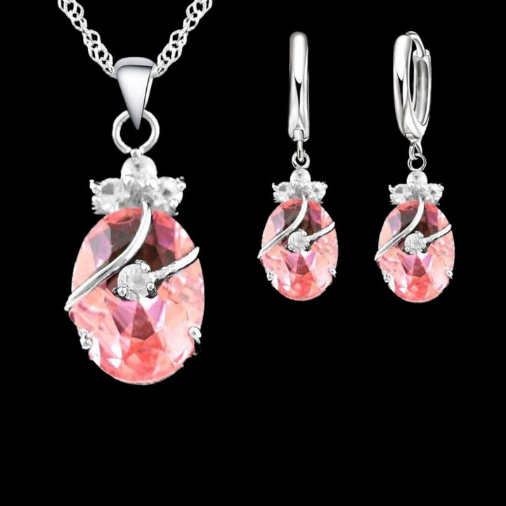 Elegant sterling silver crystal necklace and drop earrings set for women, perfect for formal wear.