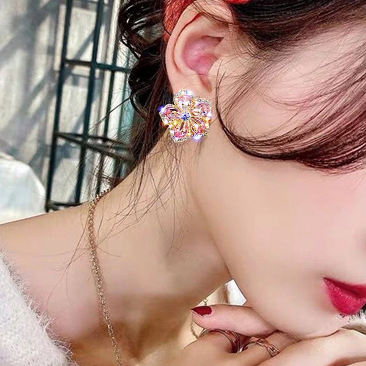 Dazzling sterling silver and zirconia rainbow earrings for women. Sparkling and colorful dangle jewelry.